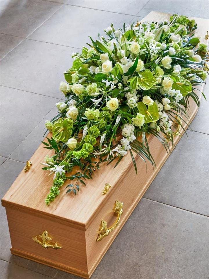 Sympathy funeral flowers Cornwall casket spray Penzance